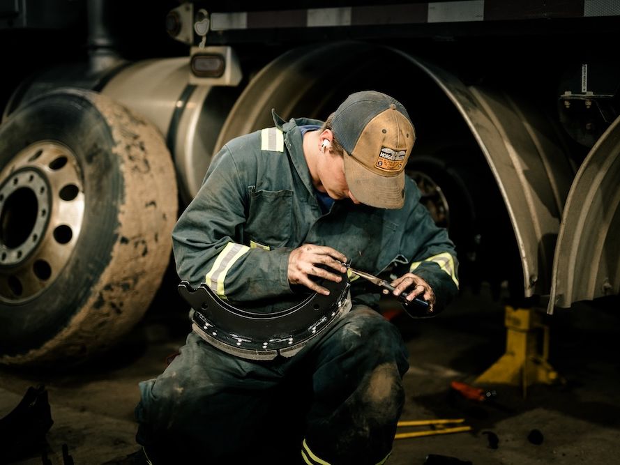 Mach 6 technician documenting a brake component inspection