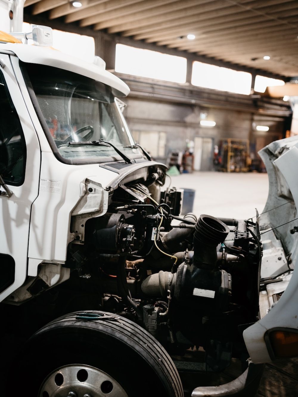 Highway tractor with the hood open for service at Mach 6